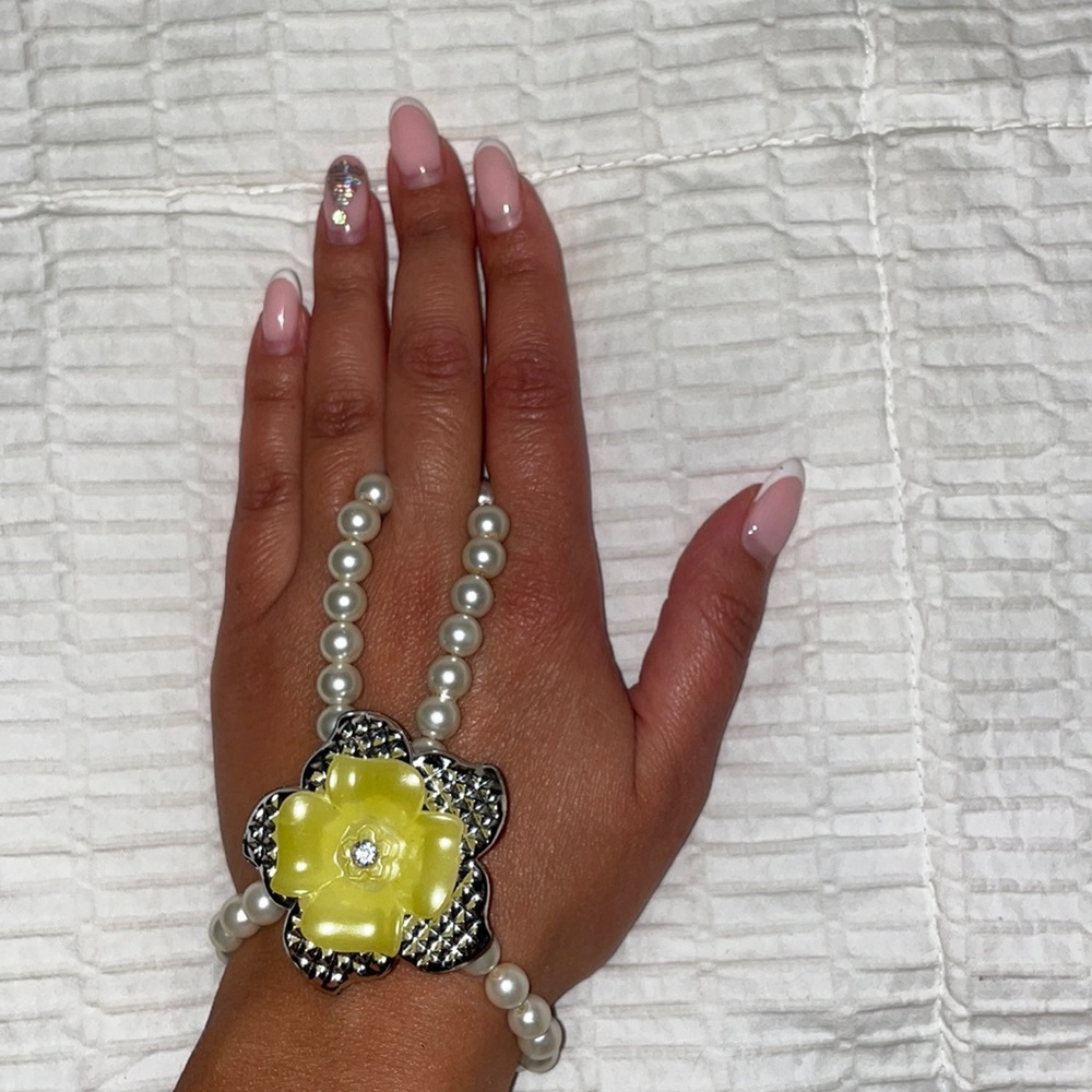 Faux Pearl Bracelet with Yellow Flower.